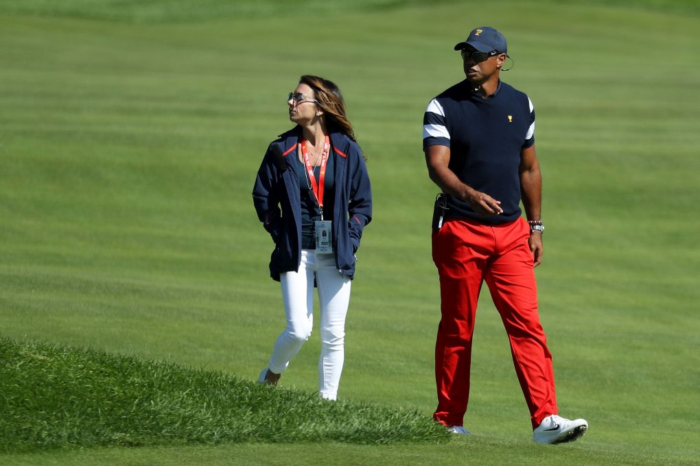 Erica Herman a Tiger Woods