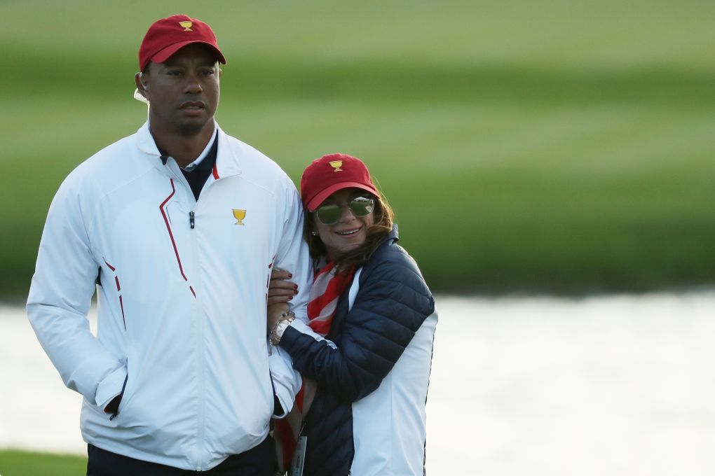 Erica Herman a Tiger Woods