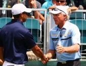 Greg Norman a Tiger Woods