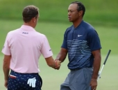 Tiger Woods a Justin Thomas